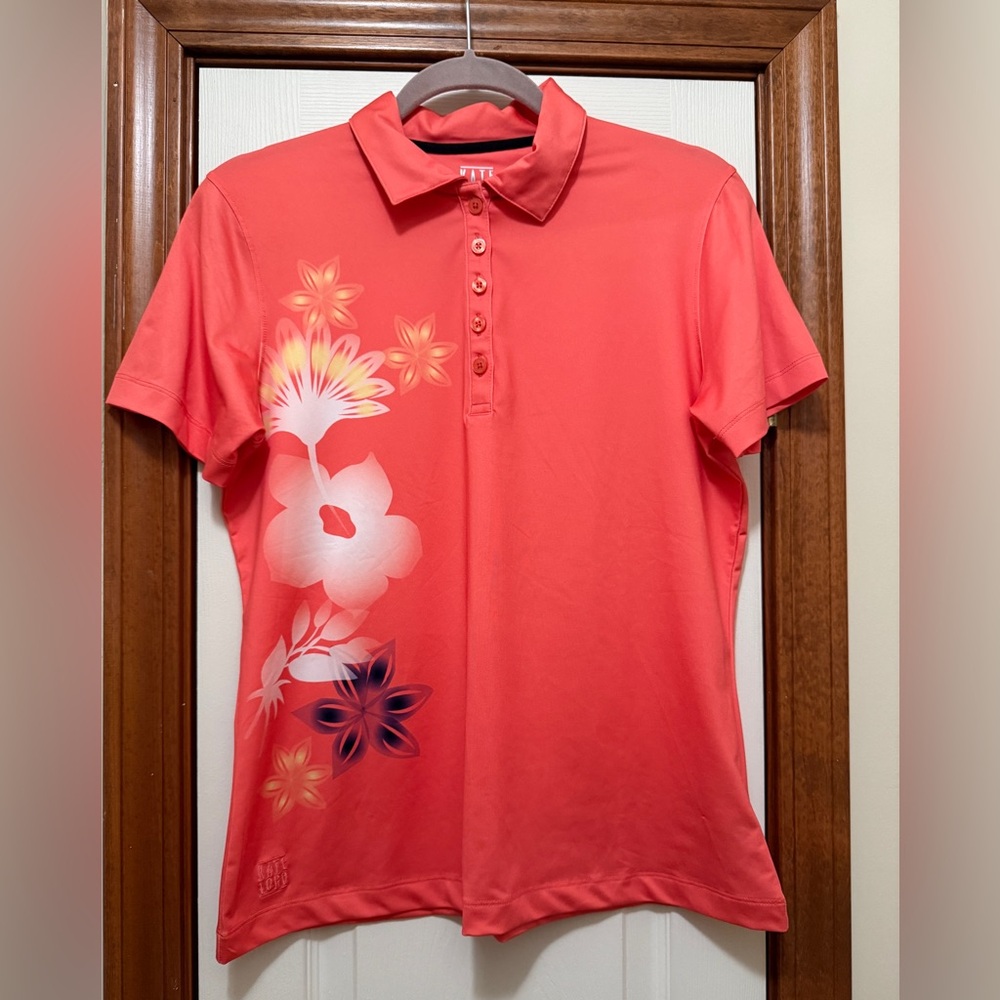 Kate Lord performance woman’s short sleeved polo. Coral floral pattern size Med